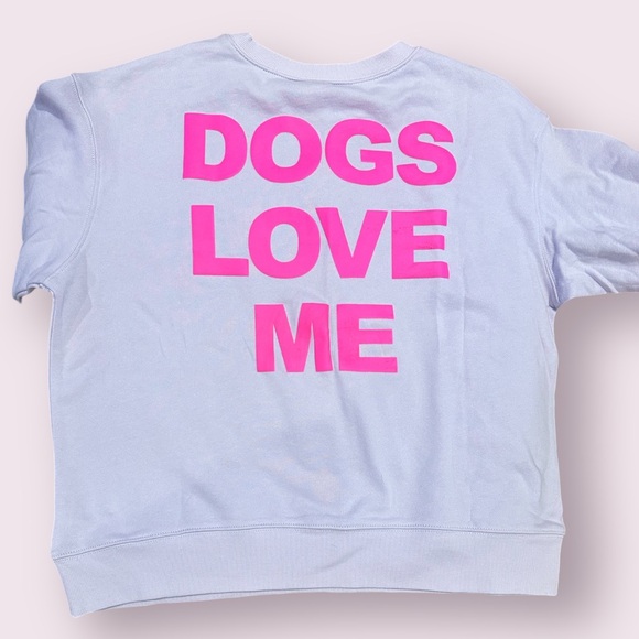 Cute Women’s Sweatshirt that Reads “Dogs Love Me” on the back. Size L. NWT - Picture 2 of 4